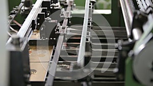 Production line at a print factory, fixing paper