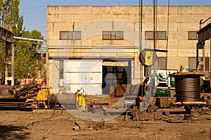 Production. The old factory. Rusty manufacturing equipment.