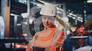 Production operator standing facility manufactory. Portrait of woman engineer
