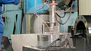 Production process drilling metal details on automated metalworking machine