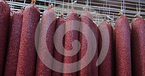 Production of smoked and dried sausages .Industrial meat processing plant.