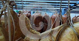 Production of smoked and dried sausages .Industrial meat processing plant.