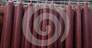 Production of smoked and dried sausages .Industrial meat processing plant.