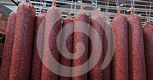 Production of smoked and dried sausages .Industrial meat processing plant.