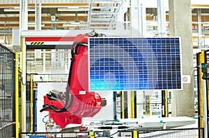 production of solar cells assembled in a high tech factory - work robot