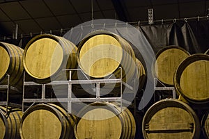 Production of sweet cassis creme liquor and marc from ripe black currant berries, distillation and maturation in wooden barrels.