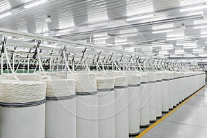 Production of threads in a textile factory