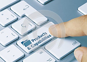 Products & Capabilities - Inscription on Blue Keyboard Key
