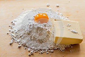 Products for dough, flour, sugar and eggs on the board