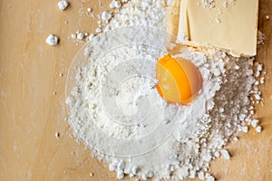 Products for dough, flour, sugar and eggs on the board