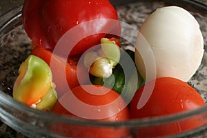 Products for the preparation of vegetable salad in a bowl close-up