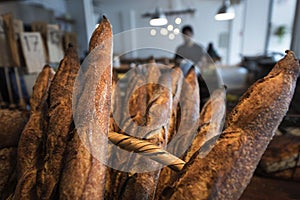 products for sale. A colorful showcase of genuine Bakery with assortment of breads baguette,\