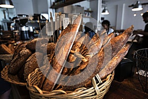 products for sale. A colorful showcase of genuine Bakery with assortment of breads baguette,\