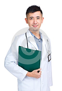 Profession asian doctor holding clipboard