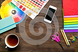 Profession concept with designer tools on work desk background top view mock-up