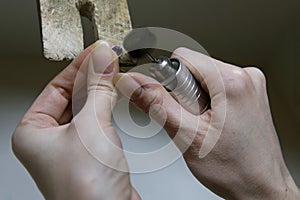 Profession jeweler. Craft jewelery making. Hands of a jeweller . Handwork . Close up.