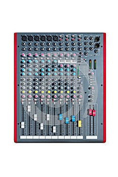 A professional 12-input sound mixer with many adjustments and knob switches, isolated on a white background with a clipping path.