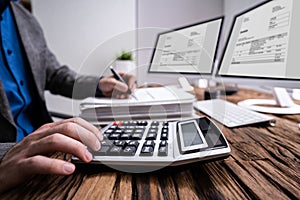 Professional Accountant Man Doing Taxation photo