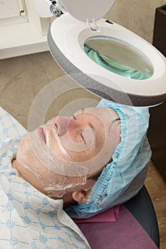 Professional acne facial cleansing in the cabin