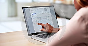 Professional African American Woman Using E-invoice Software