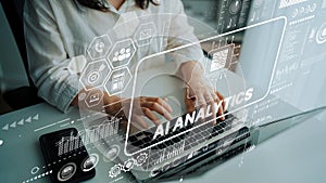 Professional analyzing data and trends with AI analytics technology on a modern laptop in a stylish workspace