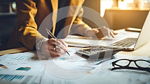 The professional analyzing financial data with a laptop and documents on the table..AI generated image