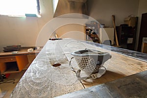 Professional anti dust face mask on display in the workshop of a carpenter.