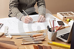 Professional architect working at his desk