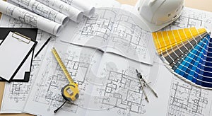 Architectural Blueprints and Design Tools on Table