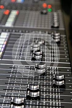 Professional audio mixer. Close up. Selective focus