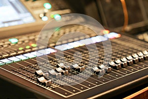 Professional audio Mixer and Professional Headphones in the Recording Studio. Sound Mixing Desk. Sound Mastering For Radio and TV