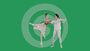 Professional ballet pair practicing moves on green screen. Gracefulness and tenderness in every movement.