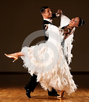 Professional ballroom dance couple preform an exhi