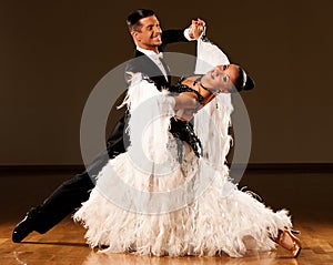 Professional ballroom dance couple preform an exhibition dance