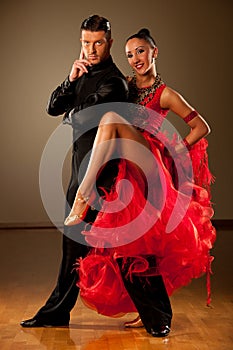 Professional ballroom dance couple preform an exhibition dance