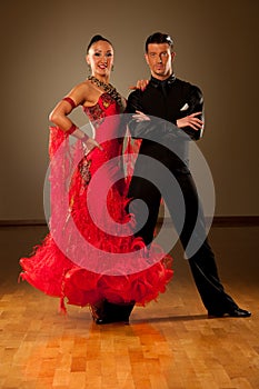 Professional ballroom dance couple preform an exhibition dance