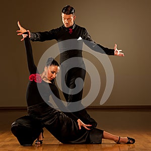 Professional ballroom dance couple preform an exhibition dance