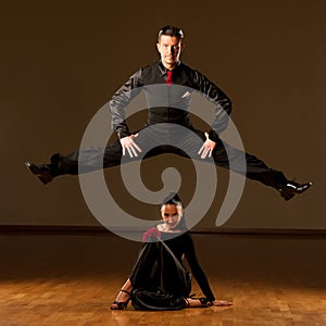 Professional ballroom dance couple preform an exhibition dance