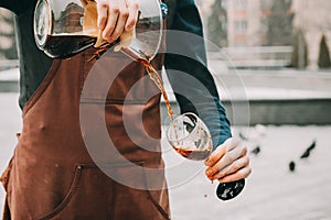 Professional barista preparing coffee alternative method