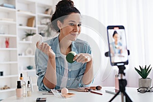Professional Beauty Blogger Woman Using Smartphone Making Video Indoors