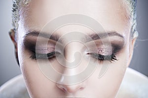 Professional beauty eyes makeup. Make up closeup. Long eyelashes and perfect skin