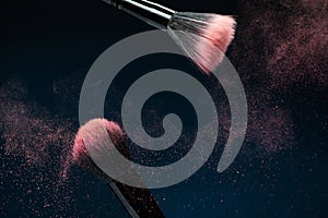 Professional black make-up brush with pink powder