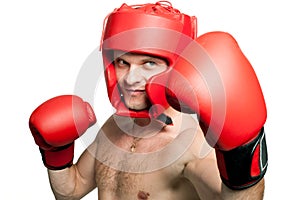 Professional boxer punching isolated on white