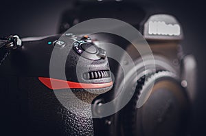 Professional build quality modern DSLR and front buttons close up, built with rugged magnesium alloy and carbon fiber materials, a