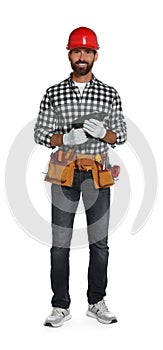 Professional builder in hard hat with tool belt and power drill isolated on white