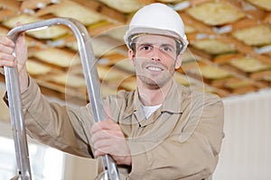 Professional builer in helmet ready to work