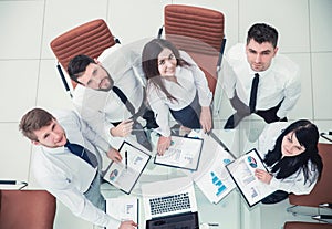 professional business team developing a new financial strategy of the company at a work location in a modern office