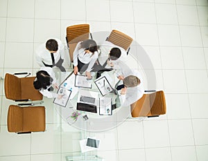 professional business team developing a new financial strategy of the company at a work location in a modern office