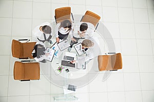 professional business team developing a new financial strategy of the company at a work location in a modern office