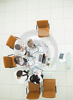 professional business team developing a new financial strategy of the company at a work location in a modern office